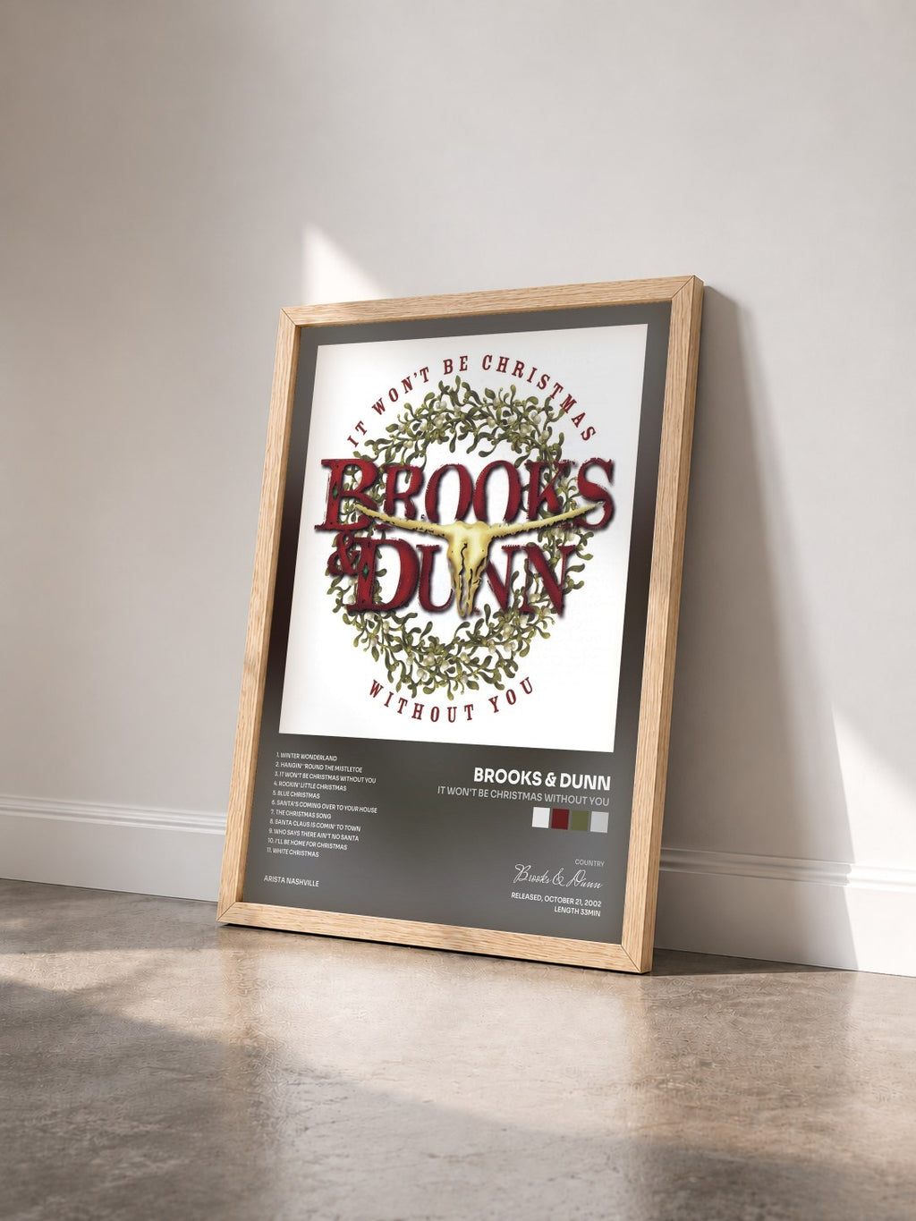 #bois Tableau de l'album It Won't Be Christmas Without You de Brooks & Dunn vu de trois quarts, cadre en bois brut