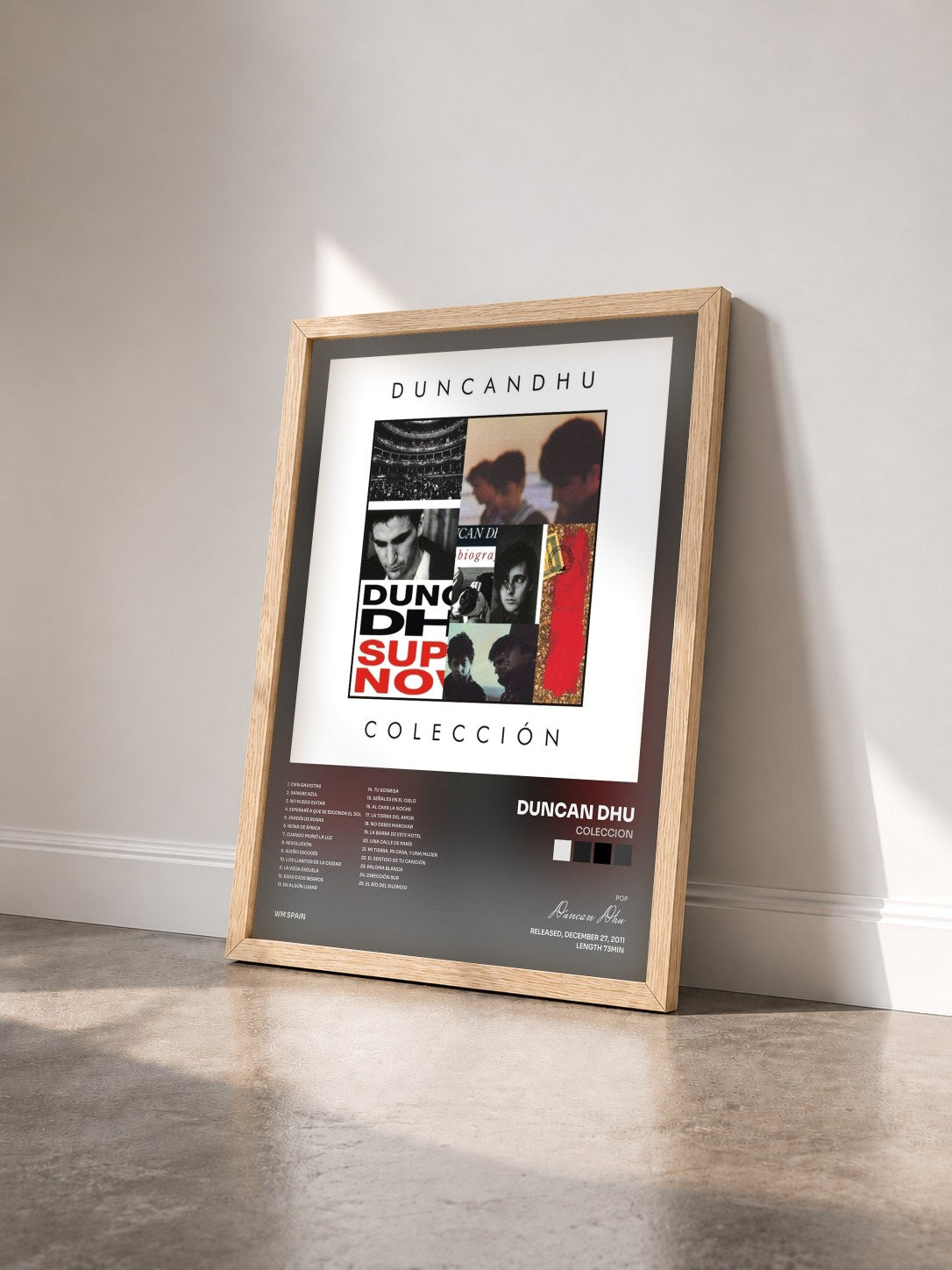 #bois Tableau de l'album Coleccion de Duncan Dhu vu de trois quarts, cadre en bois brut