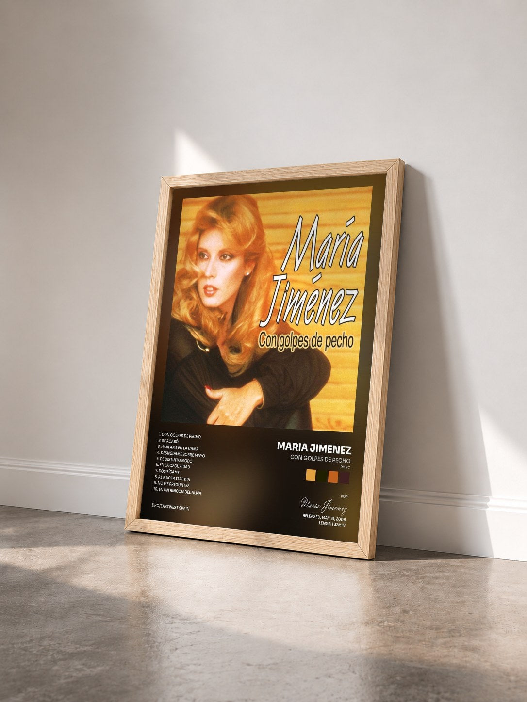 #bois Tableau de l'album Con golpes de pecho (Dienc) de Maria Jimenez vu de trois quarts, cadre en bois brut