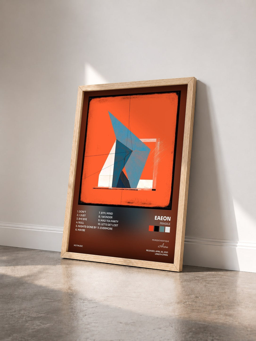 #bois Tableau de l'album Fragile de eAeon vu de trois quarts, cadre en bois brut