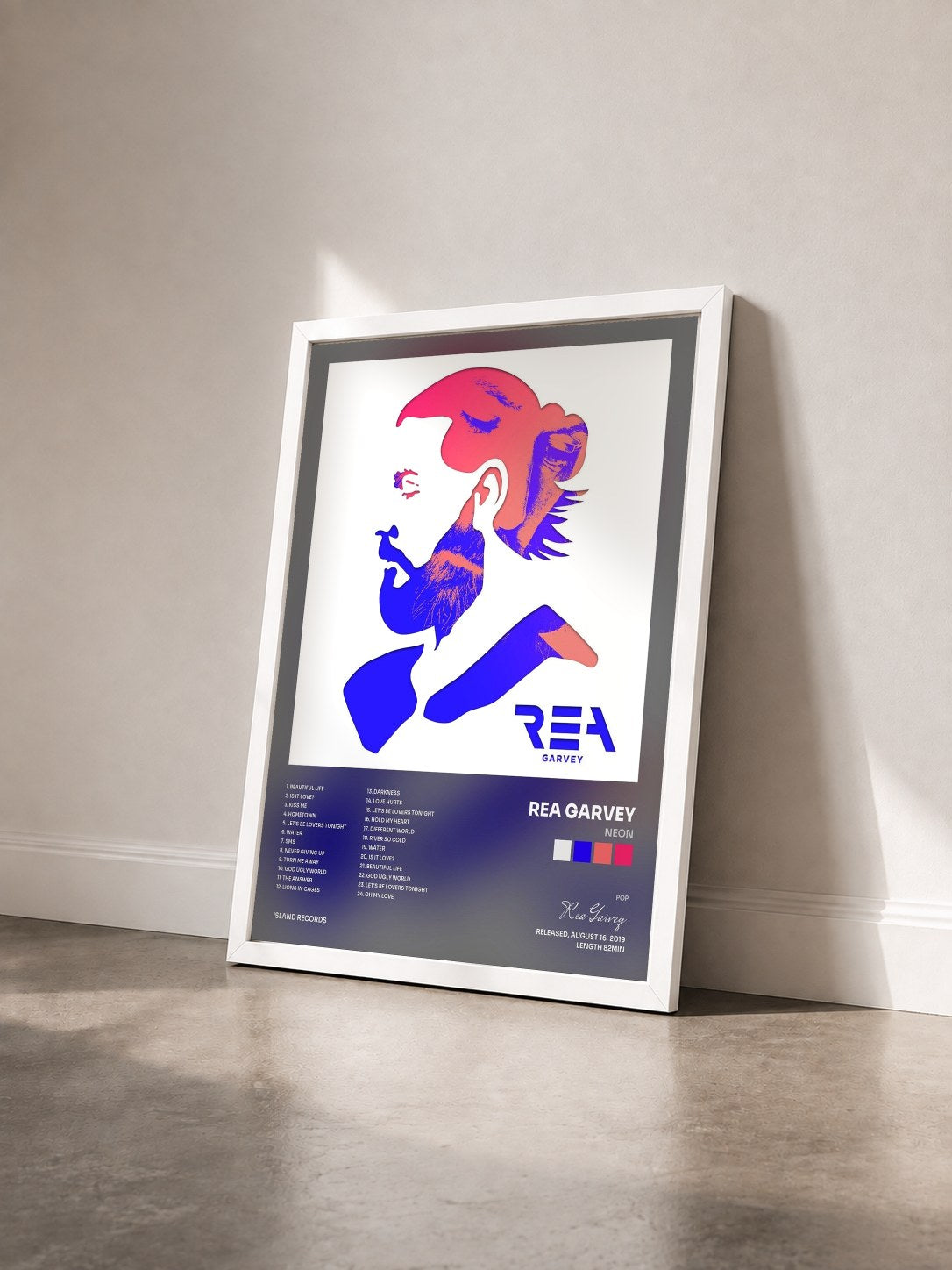 #blanc Tableau de l'album Neon de Rea Garvey vu de trois quarts, cadre blanc