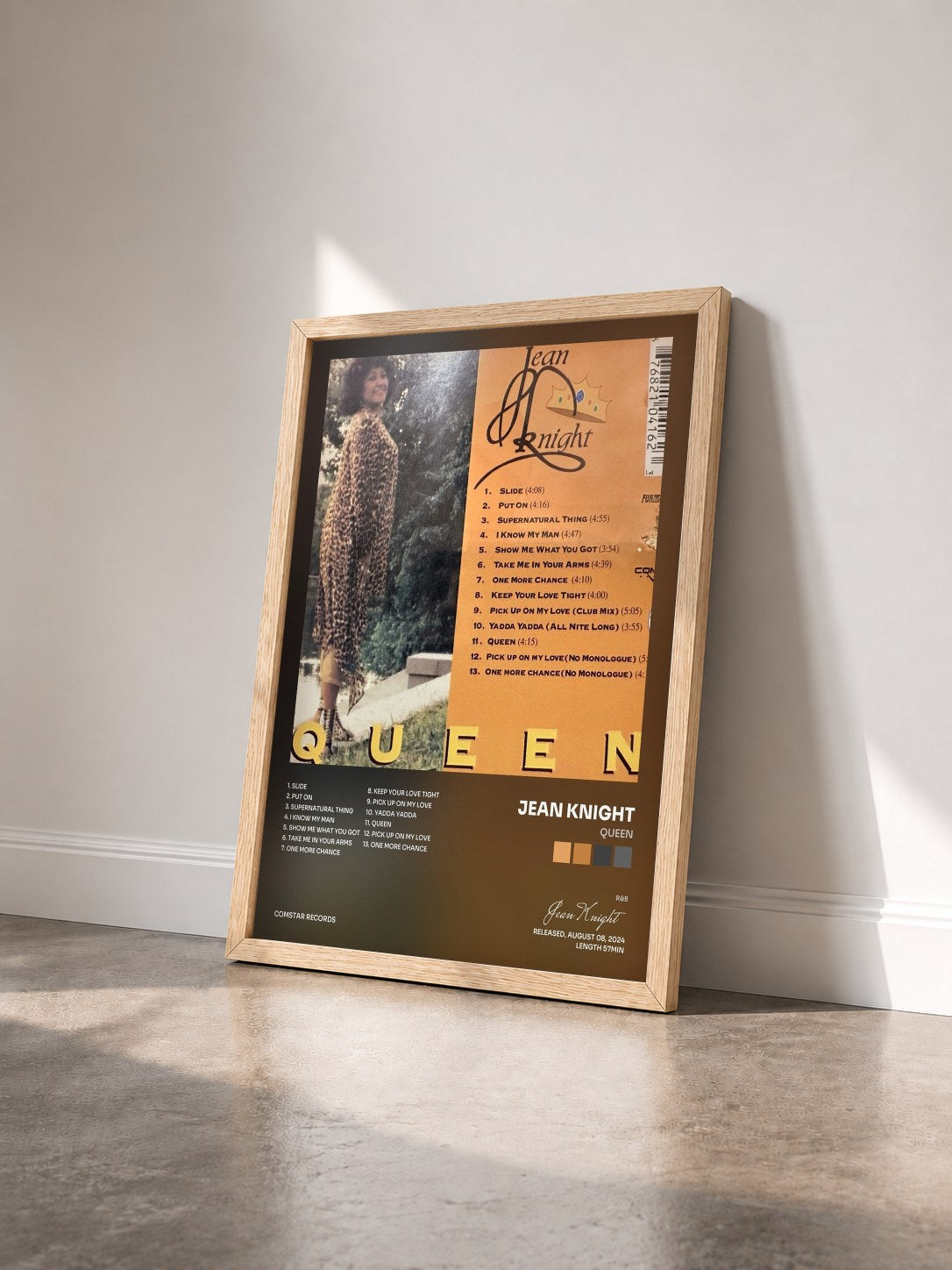 #bois Tableau de l'album Queen de Jean Knight vu de trois quarts, cadre en bois brut