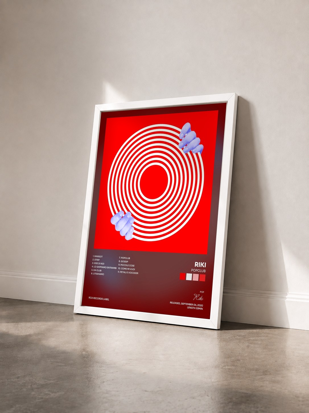 #blanc Tableau de l'album POPCLUB de Riki vu de trois quarts, cadre blanc