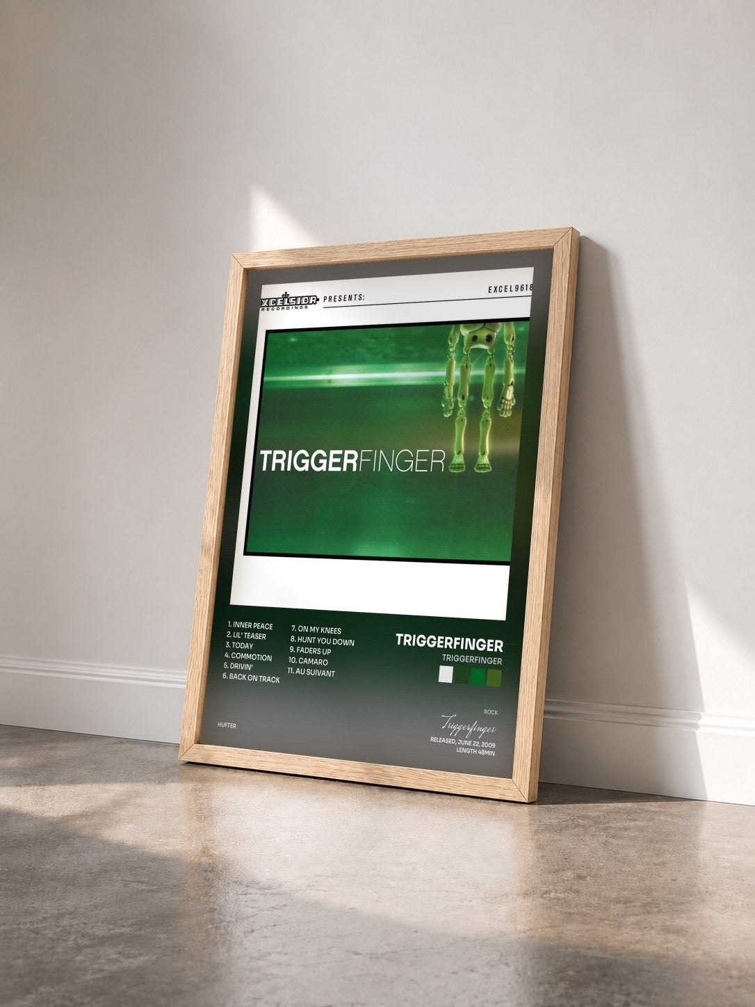#bois Tableau de l'album Triggerfinger de Triggerfinger vu de trois quarts, cadre en bois brut