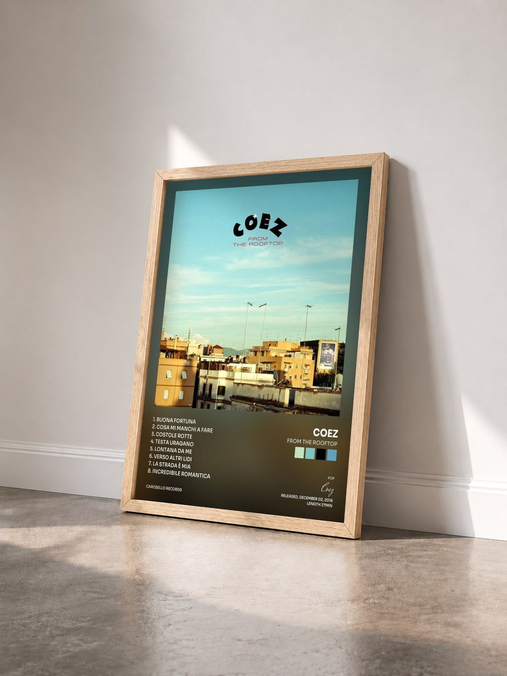 #bois Tableau de l'album From the Rooftop de Coez vu de trois quarts, cadre en bois brut