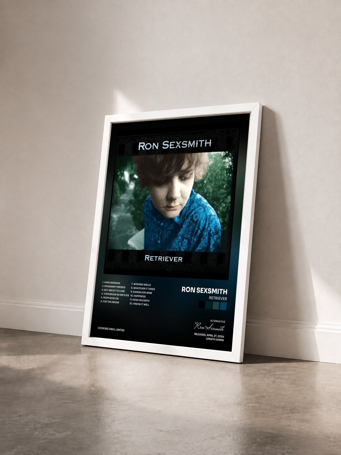#blanc Tableau de l'album Retriever de Ron Sexsmith vu de trois quarts, cadre blanc