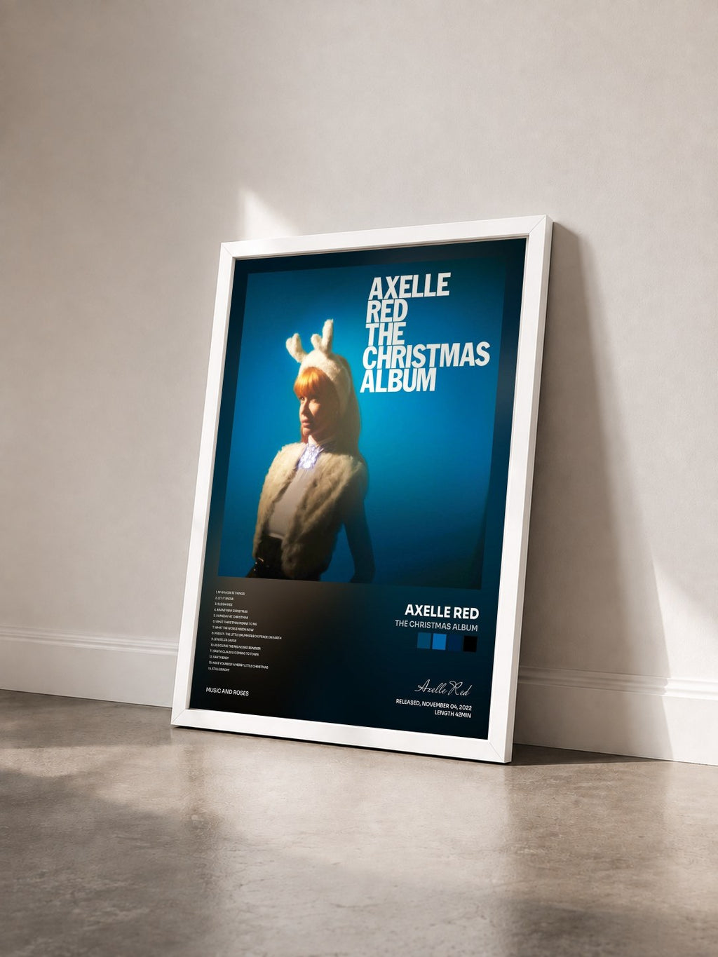 #blanc Tableau de l'album The Christmas Album de Axelle Red vu de trois quarts, cadre blanc
