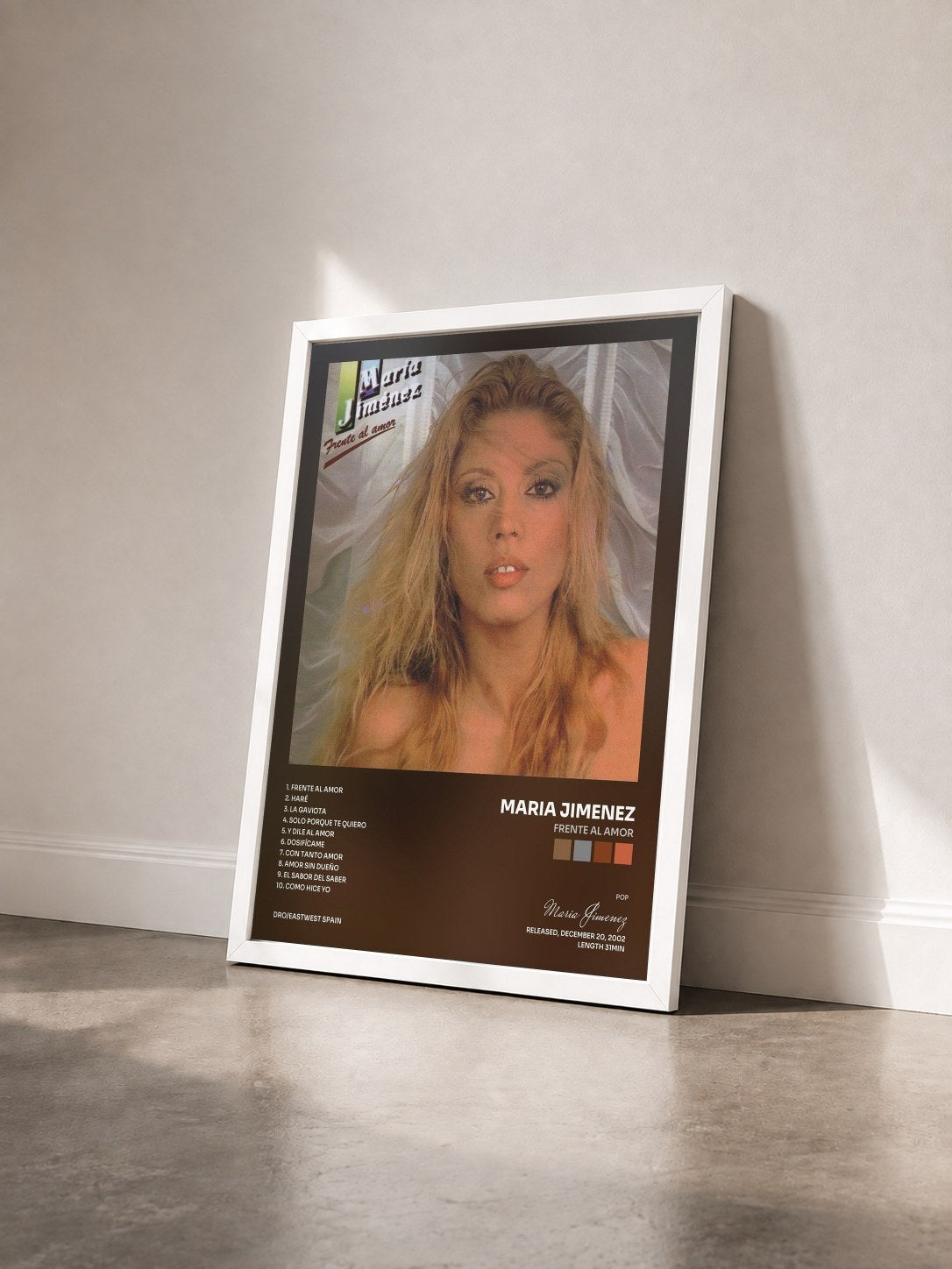 #blanc Tableau de l'album Frente al amor de Maria Jimenez vu de trois quarts, cadre blanc