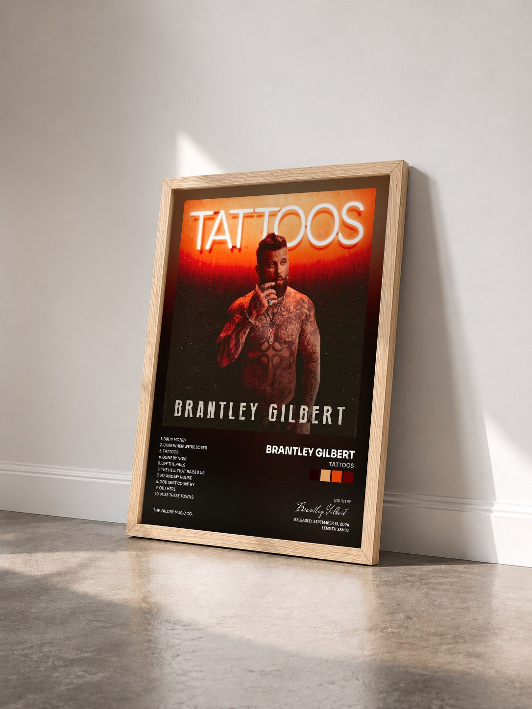 #bois Tableau de l'album Tattoos de Brantley Gilbert vu de trois quarts, cadre en bois brut