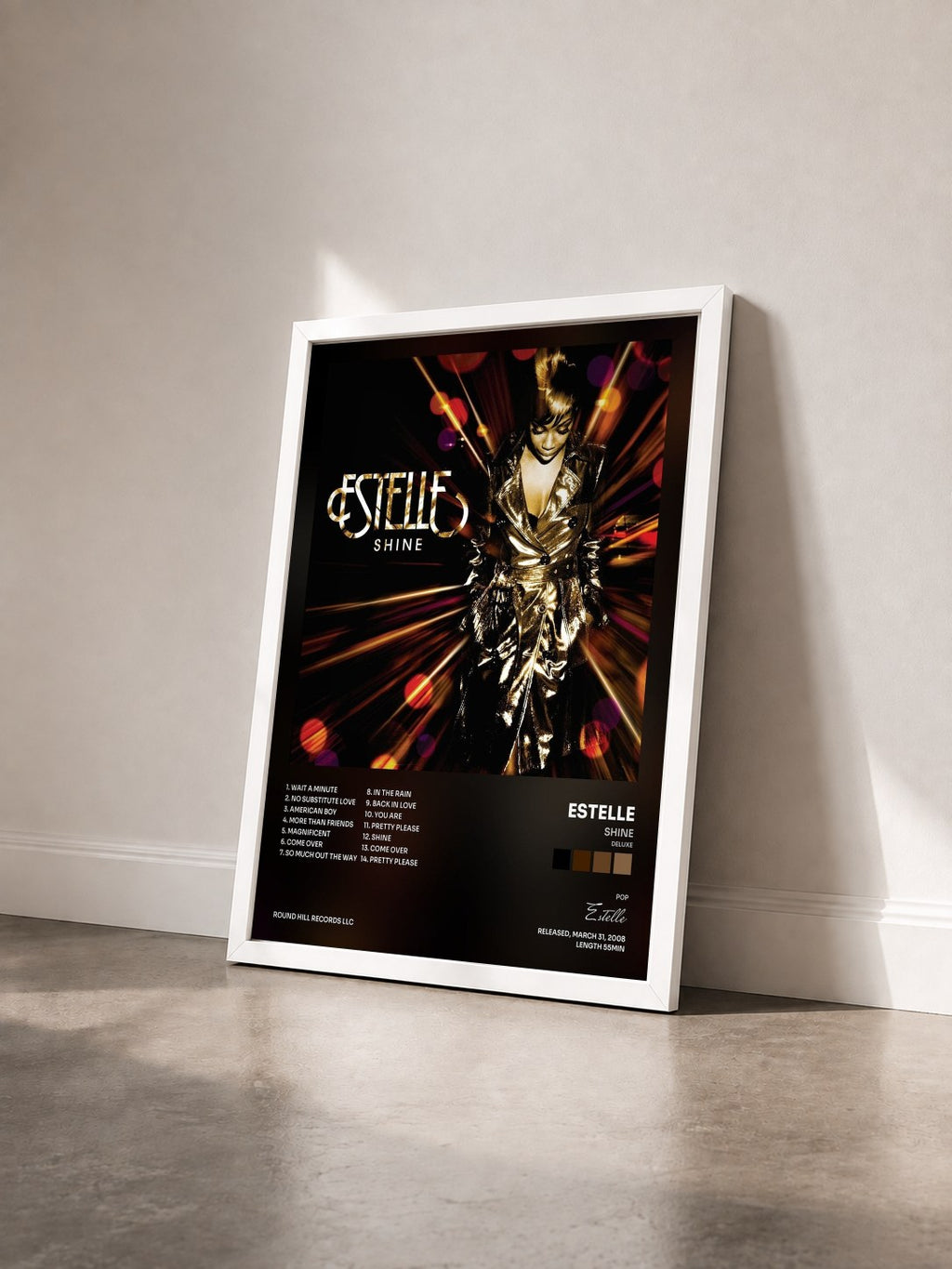 #blanc Tableau de l'album Shine (Deluxe) de Estelle vu de trois quarts, cadre blanc