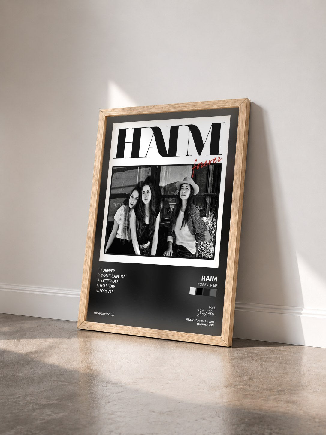 #bois Tableau de l'album Forever EP de HAIM vu de trois quarts, cadre en bois brut