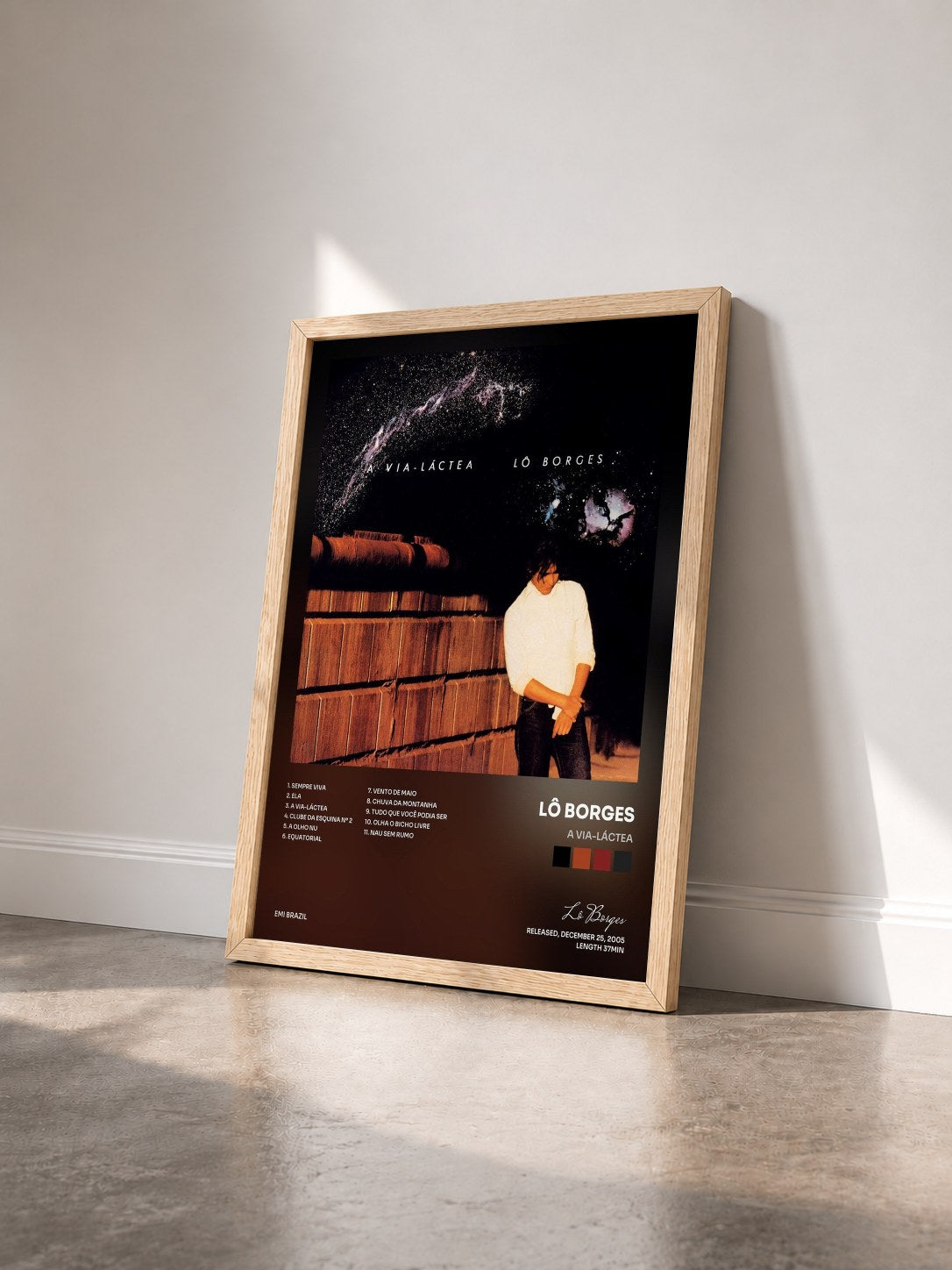 #bois Tableau de l'album A Via-Láctea de Lô Borges vu de trois quarts, cadre en bois brut