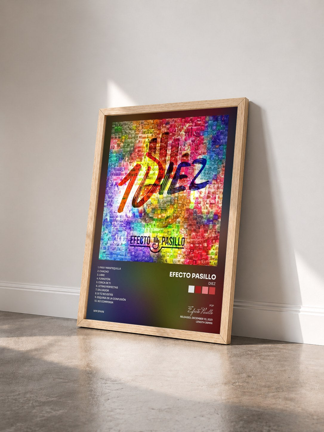 #bois Tableau de l'album DIEZ de Efecto Pasillo vu de trois quarts, cadre en bois brut