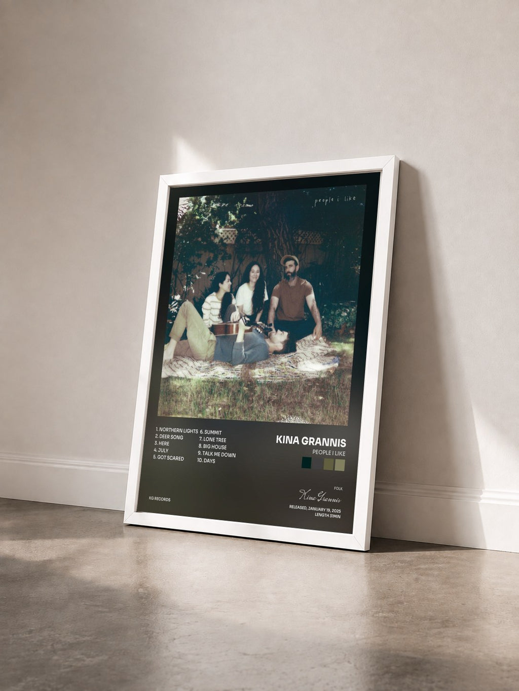 #blanc Tableau de l'album people i like de Kina Grannis vu de trois quarts, cadre blanc