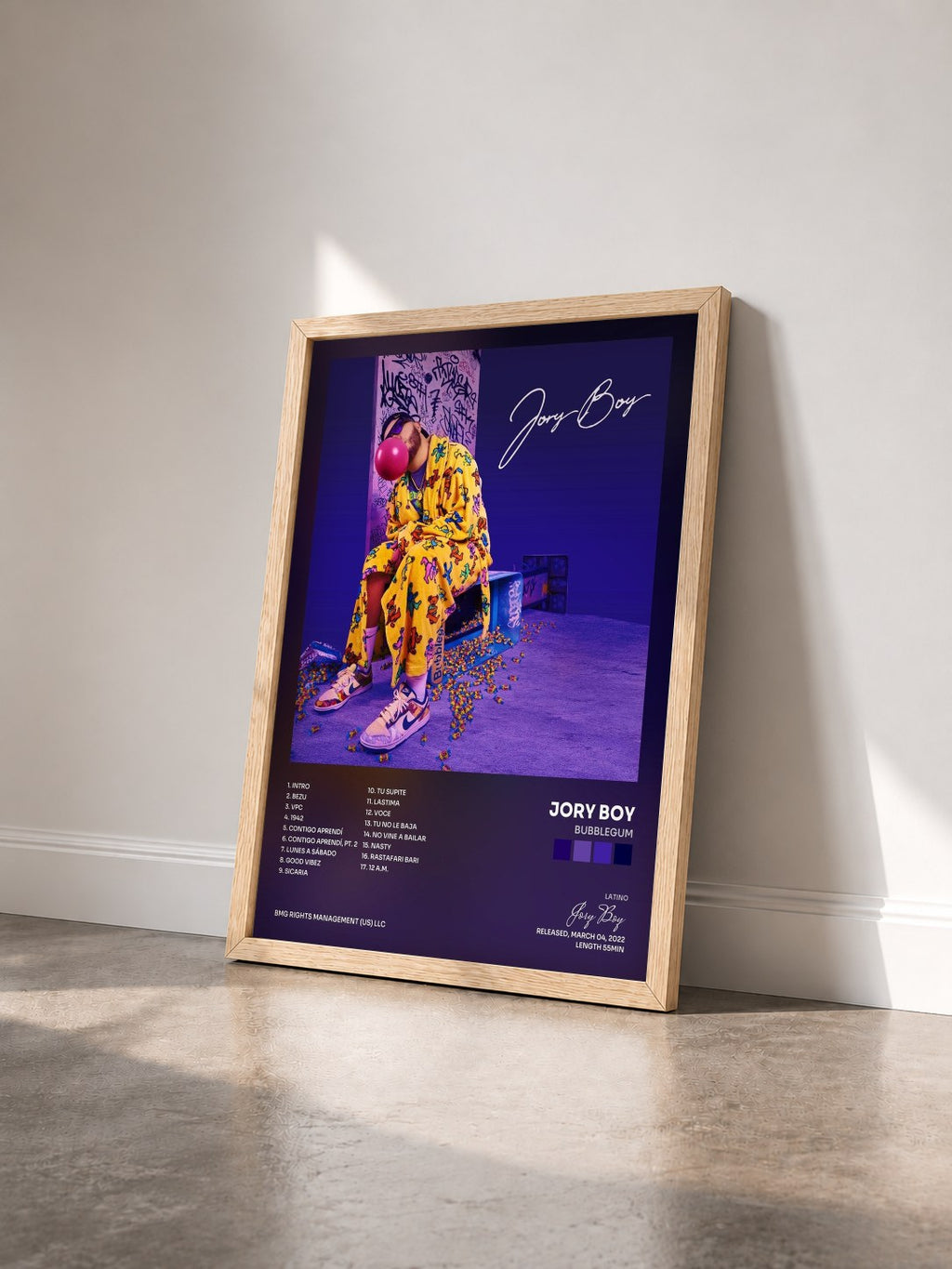 #bois Tableau de l'album Bubblegum de Jory Boy vu de trois quarts, cadre en bois brut