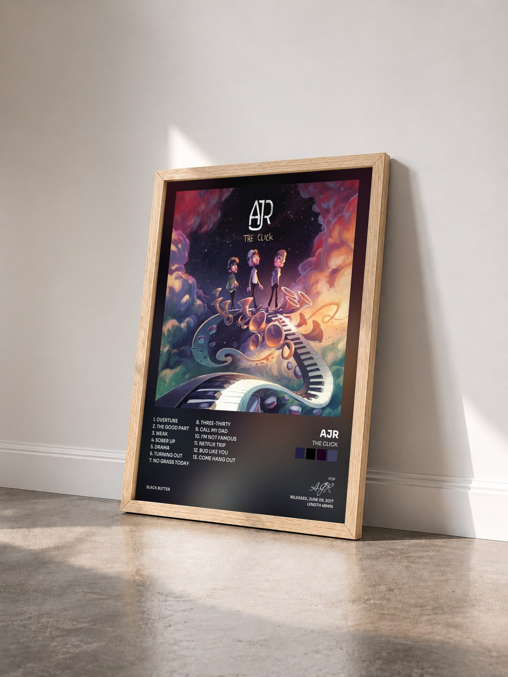 #bois Tableau de l'album The Click de AJR vu de trois quarts, cadre en bois brut