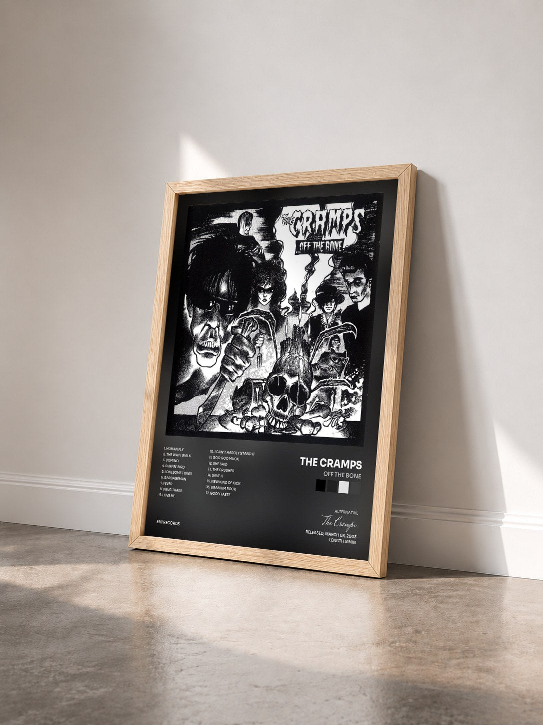 #bois Tableau de l'album Off The Bone de The Cramps vu de trois quarts, cadre en bois brut