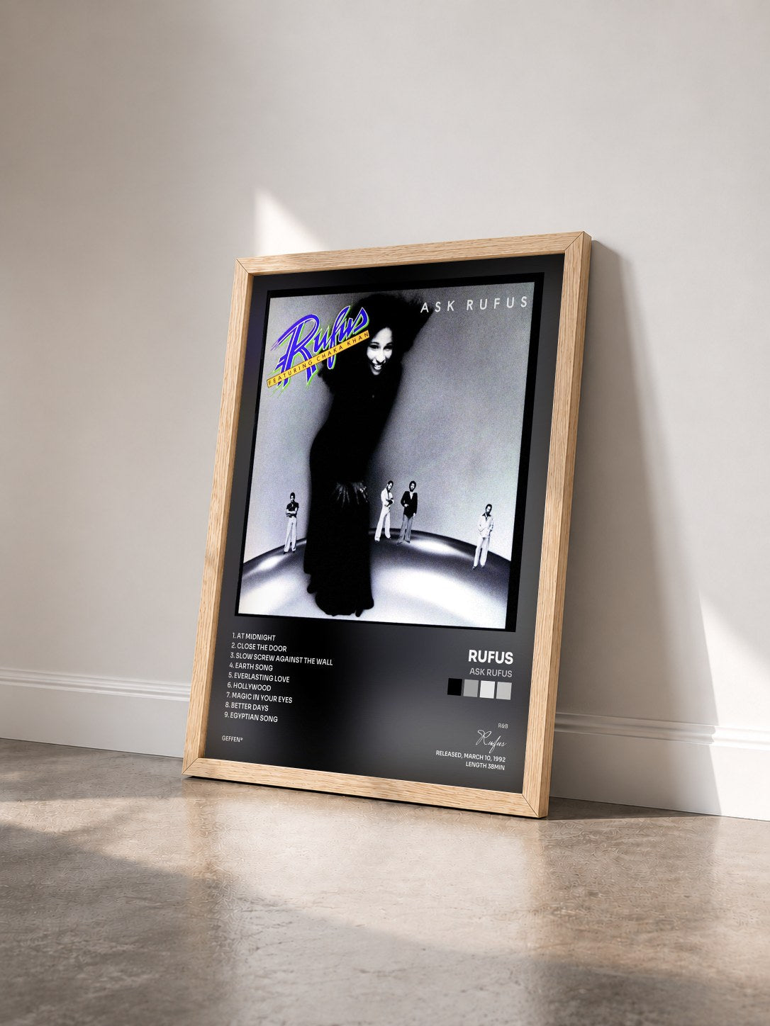 #bois Tableau de l'album Ask Rufus de Rufus vu de trois quarts, cadre en bois brut