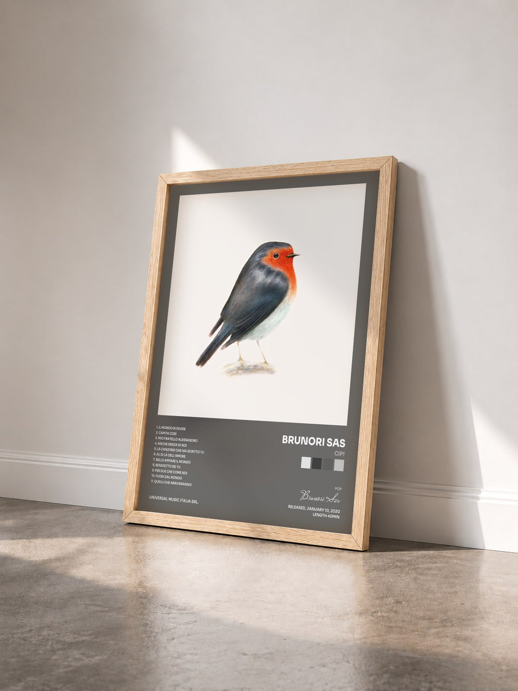 #bois Tableau de l'album Cip! de Brunori Sas vu de trois quarts, cadre en bois brut