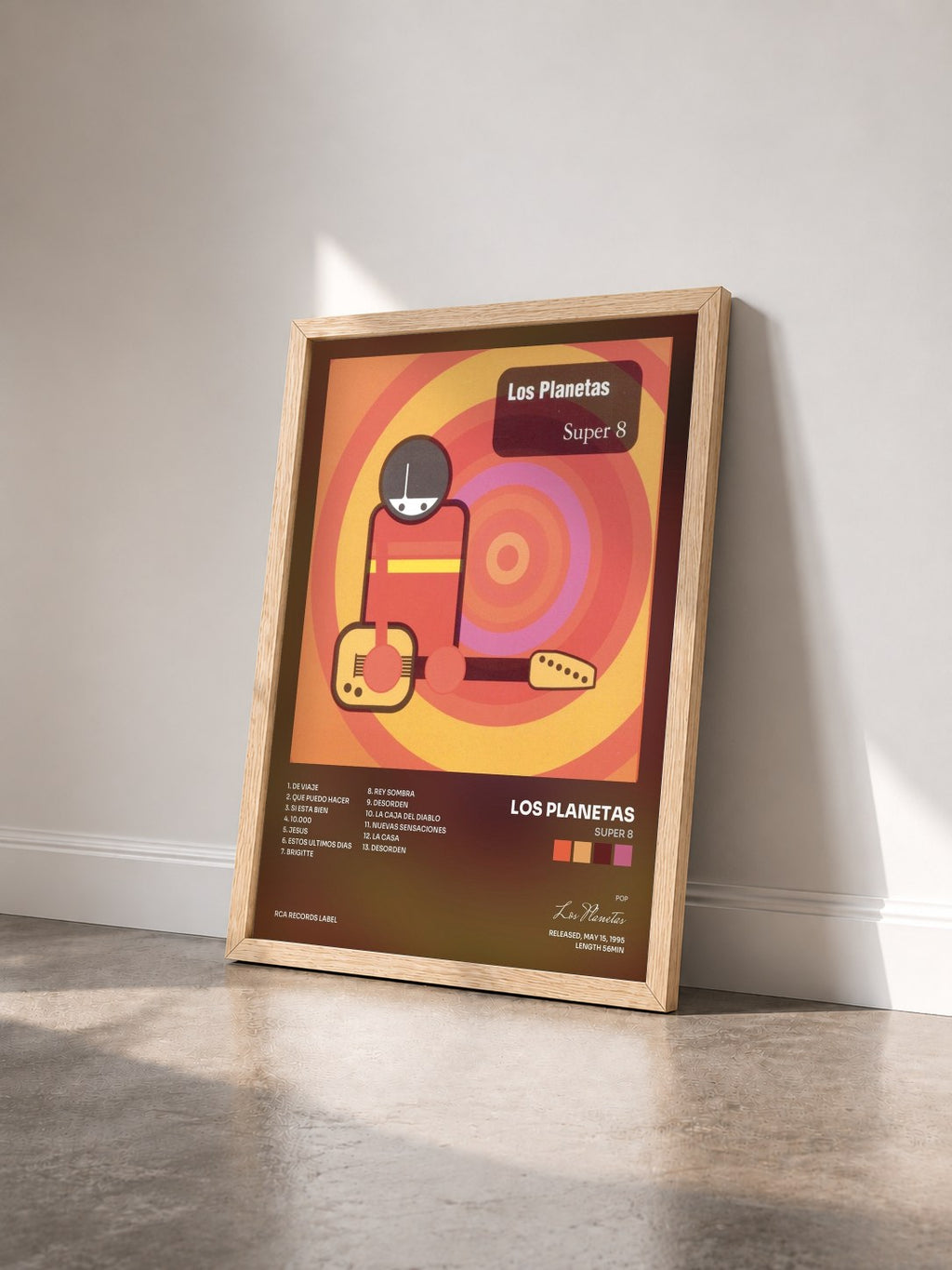 #bois Tableau de l'album Super 8 de Los Planetas vu de trois quarts, cadre en bois brut