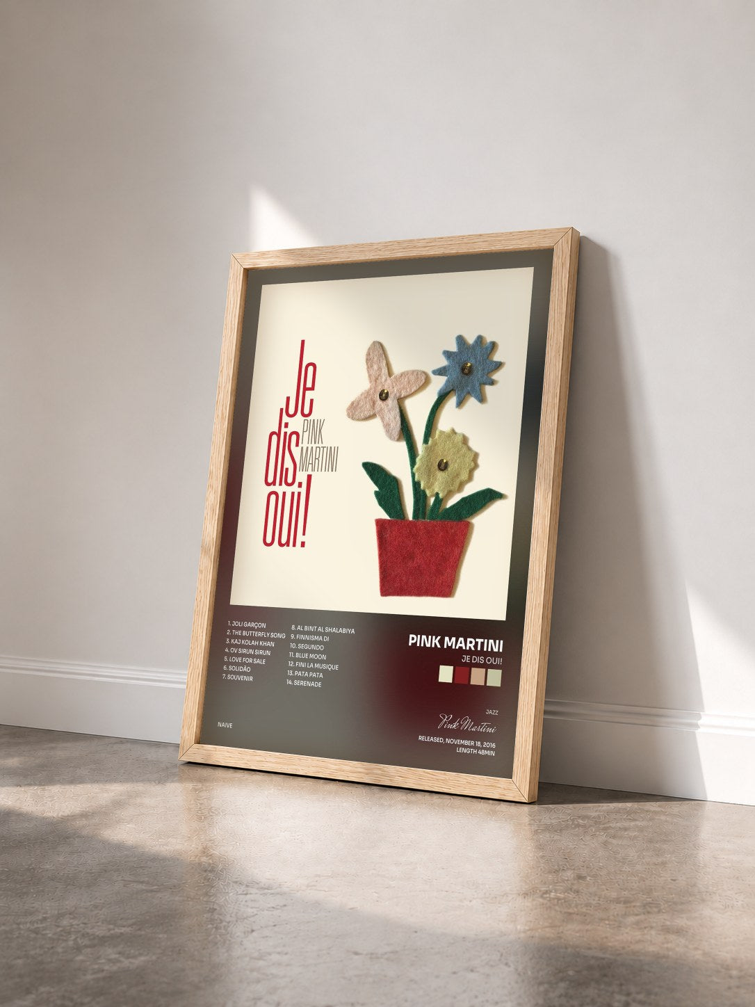 #bois Tableau de l'album Je dis oui! de Pink Martini vu de trois quarts, cadre en bois brut