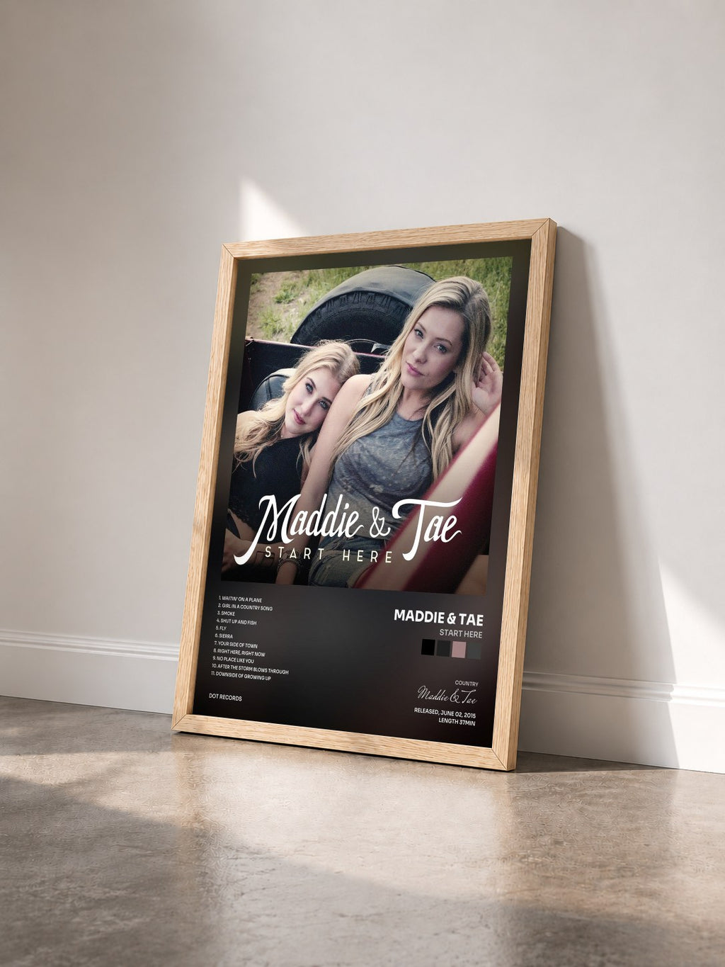 #bois Tableau de l'album Start Here de Maddie & Tae vu de trois quarts, cadre en bois brut