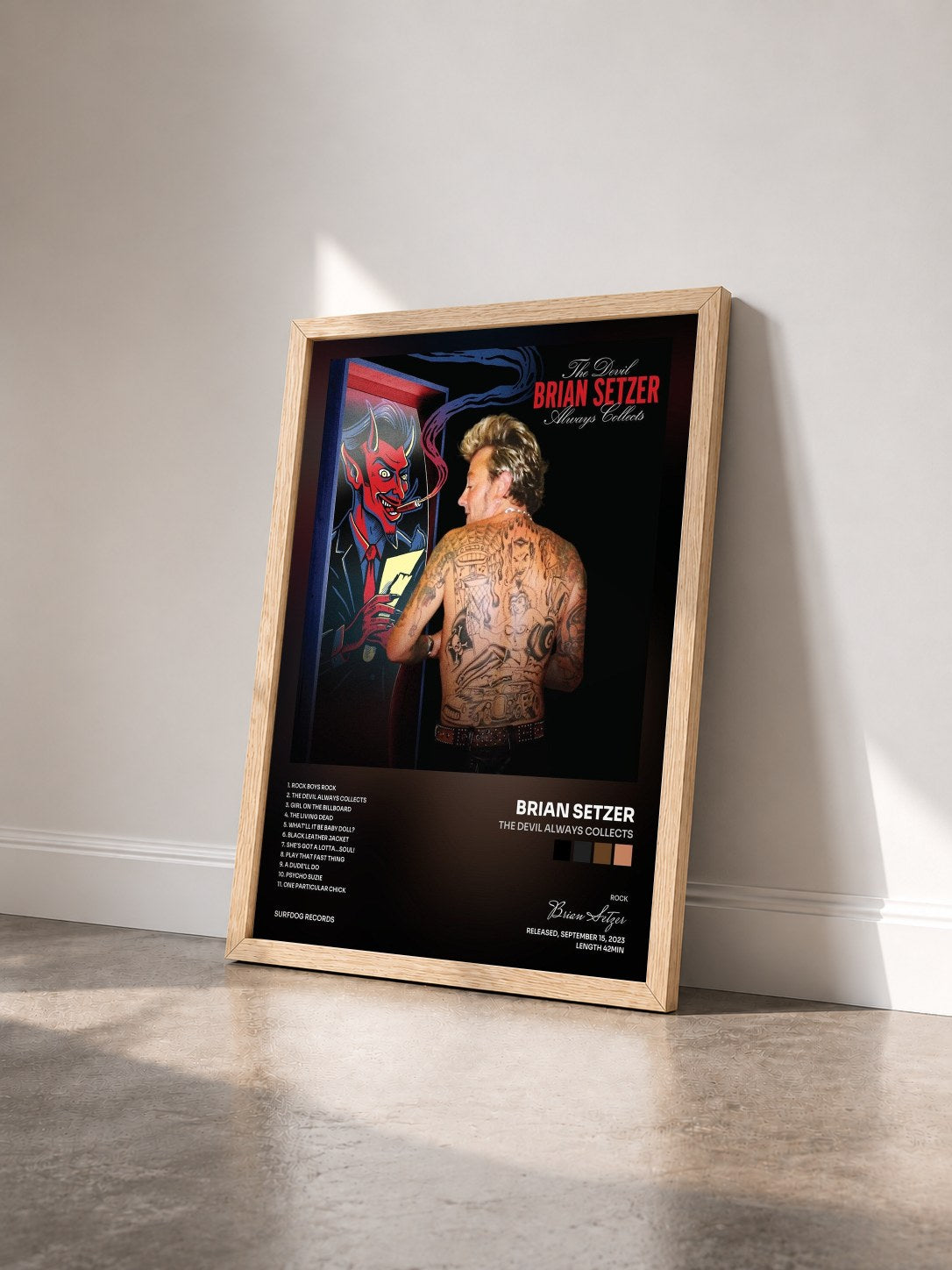 #bois Tableau de l'album The Devil Always Collects de Brian Setzer vu de trois quarts, cadre en bois brut