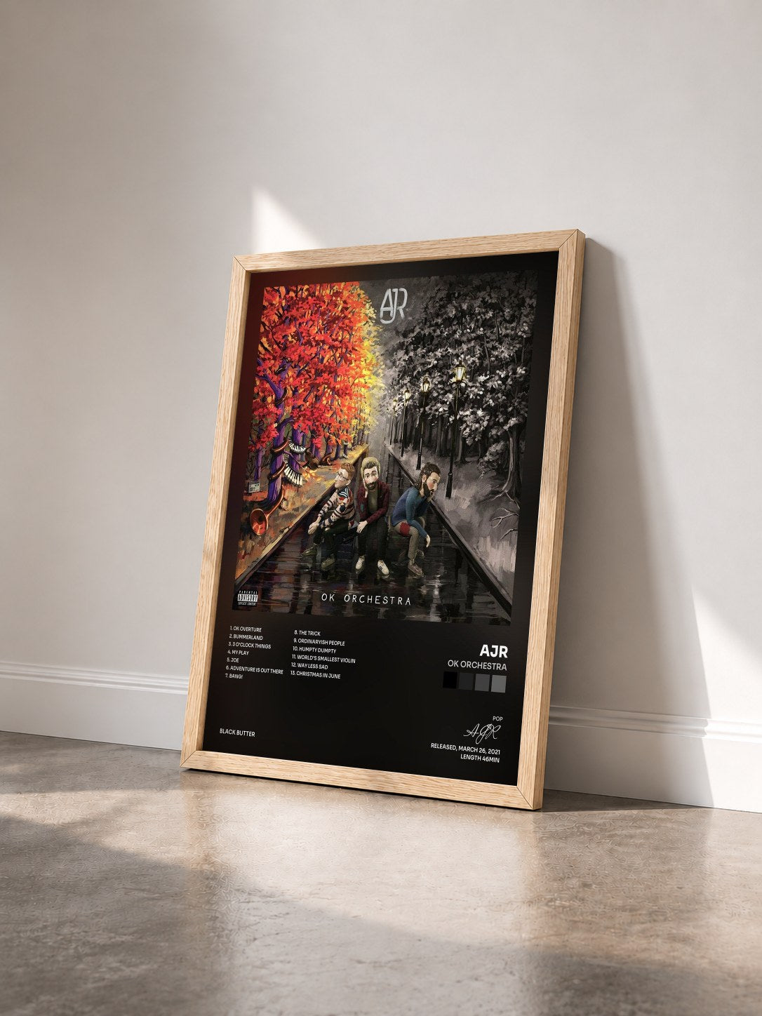 #bois Tableau de l'album OK ORCHESTRA de AJR vu de trois quarts, cadre en bois brut