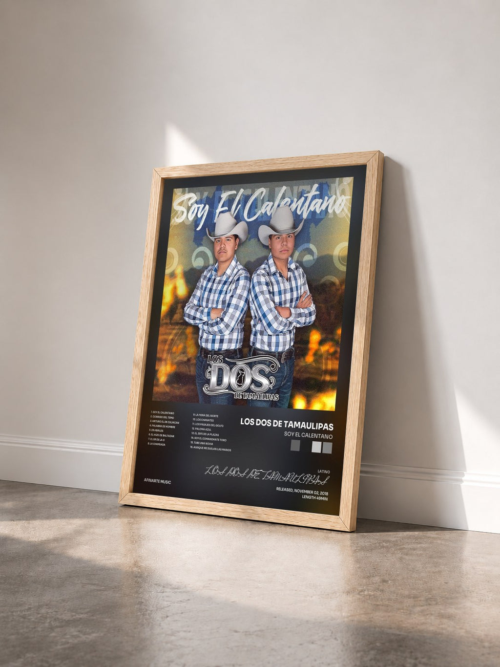 #bois Tableau de l'album Soy El Calentano de LOS DOS DE TAMAULIPAS vu de trois quarts, cadre en bois brut