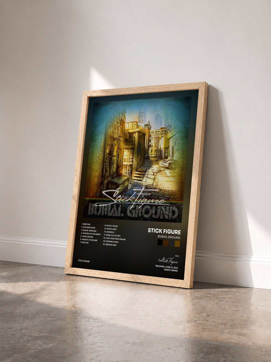 #bois Tableau de l'album Burial Ground de Stick Figure vu de trois quarts, cadre en bois brut