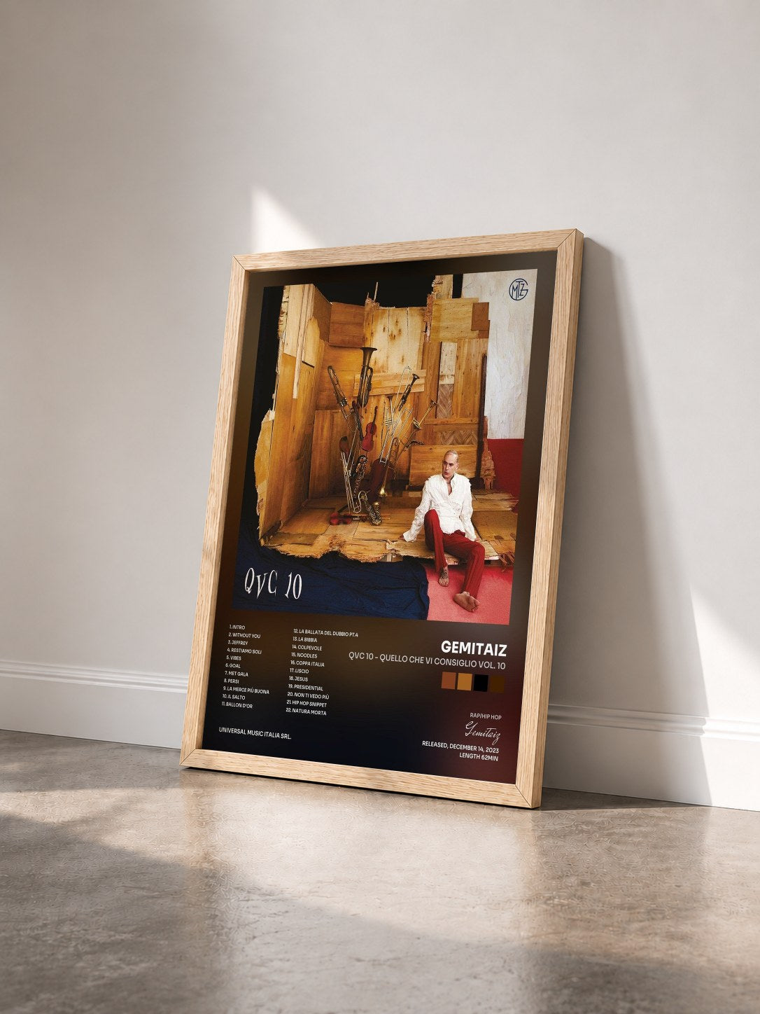 #bois Tableau de l'album QVC 10 - Quello Che Vi Consiglio Vol. 10 de Gemitaiz vu de trois quarts, cadre en bois brut