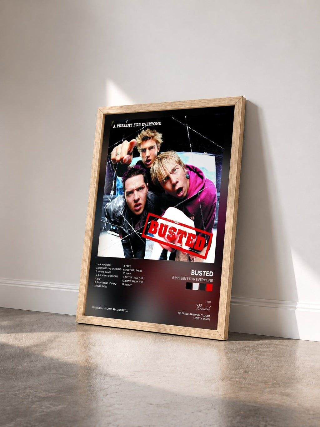 #bois Tableau de l'album A Present For Everyone de Busted vu de trois quarts, cadre en bois brut