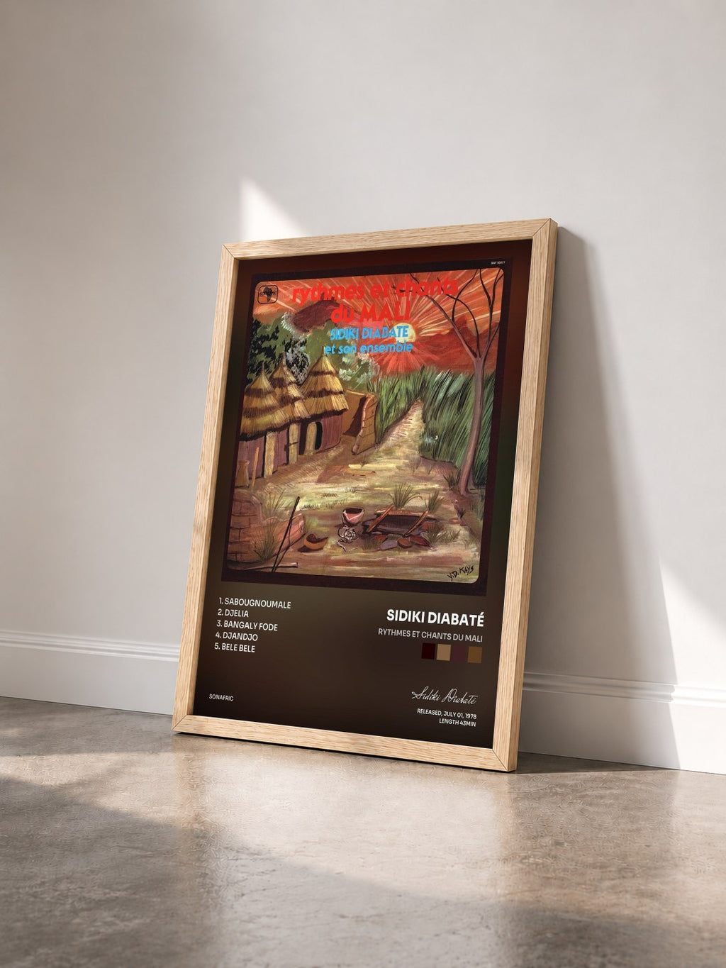 #bois Tableau de l'album Rythmes Et Chants Du Mali de Sidiki Diabaté vu de trois quarts, cadre en bois brut