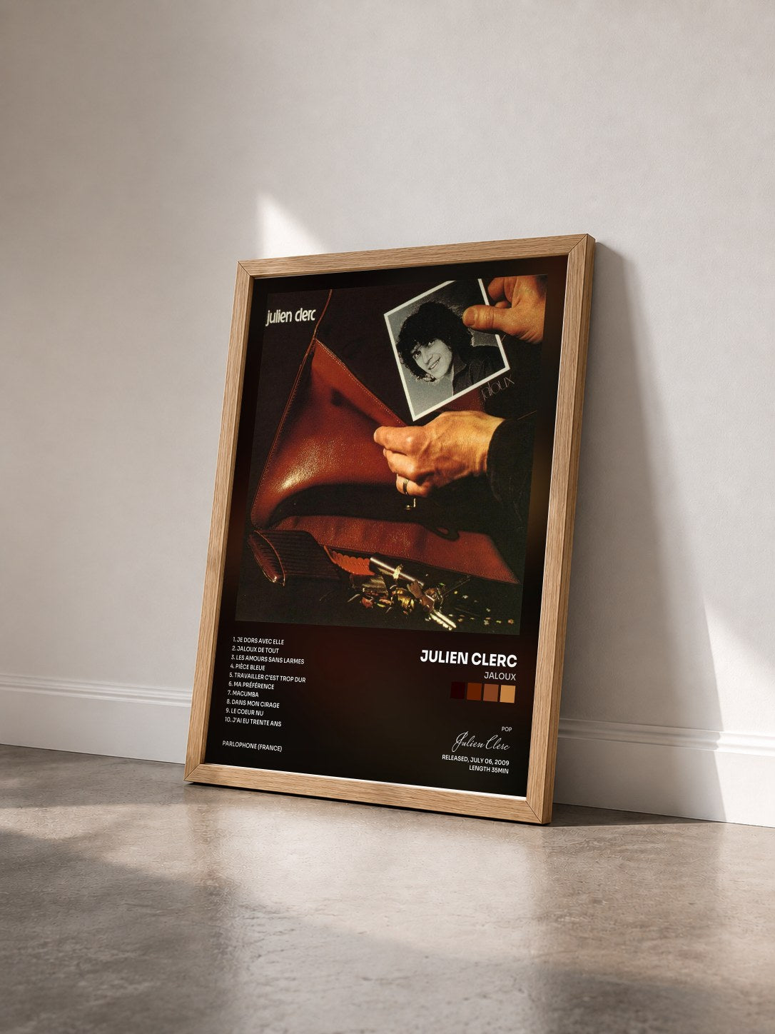 #bois Tableau de l'album Jaloux de Julien Clerc vu de trois quarts, cadre en bois brut