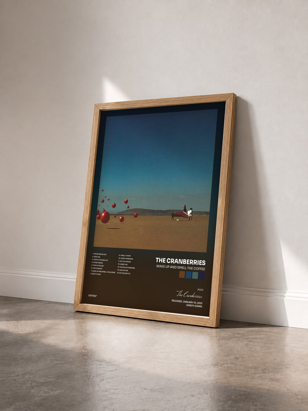 #bois Tableau de l'album Wake Up And Smell The Coffee de The Cranberries vu de trois quarts, cadre en bois brut