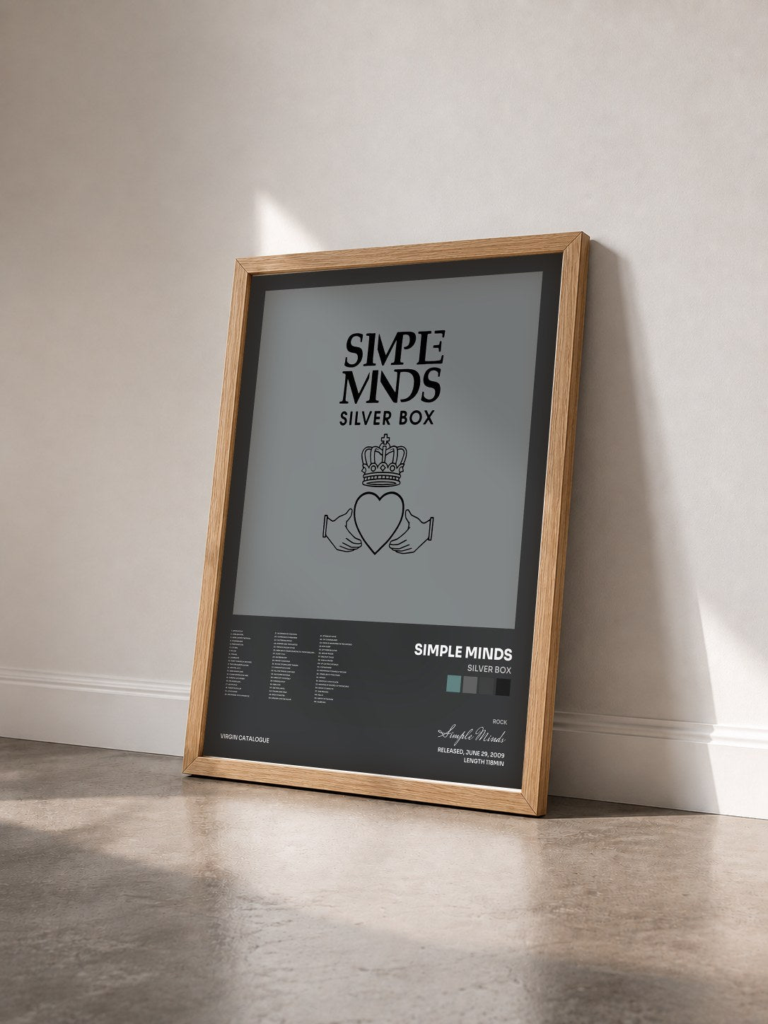 #bois Tableau de l'album Silver Box de Simple Minds vu de trois quarts, cadre en bois brut