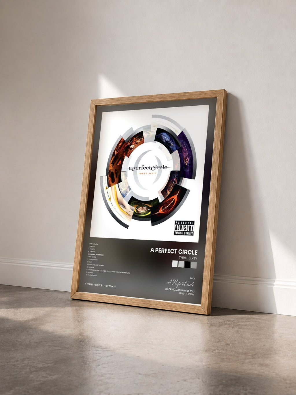 #bois Tableau de l'album Three Sixty de A Perfect Circle vu de trois quarts, cadre en bois brut