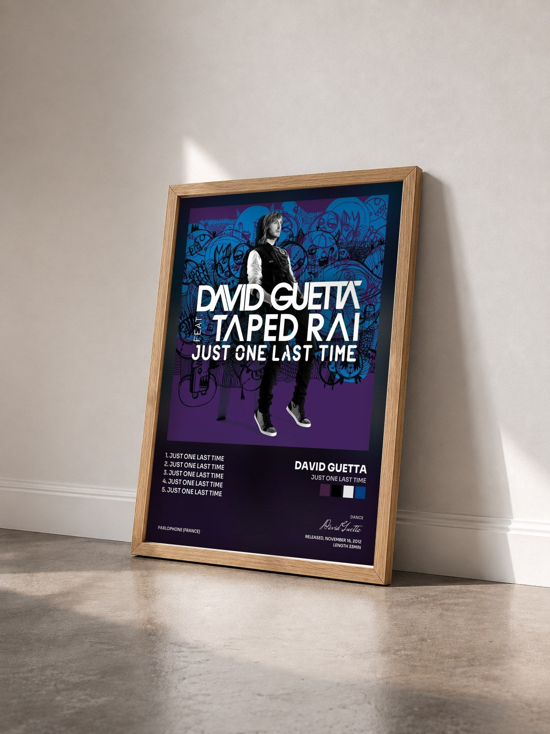 #bois Tableau de l'album Just One Last Time de David Guetta vu de trois quarts, cadre en bois brut