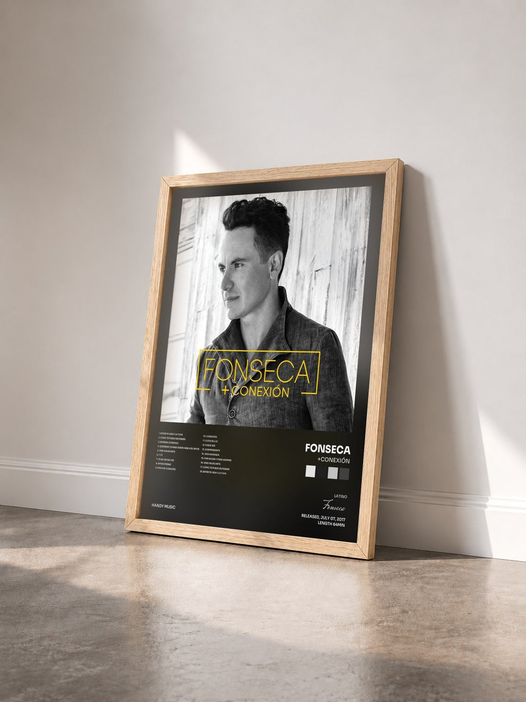 #bois Tableau de l'album +Conexión de Fonseca vu de trois quarts, cadre en bois brut