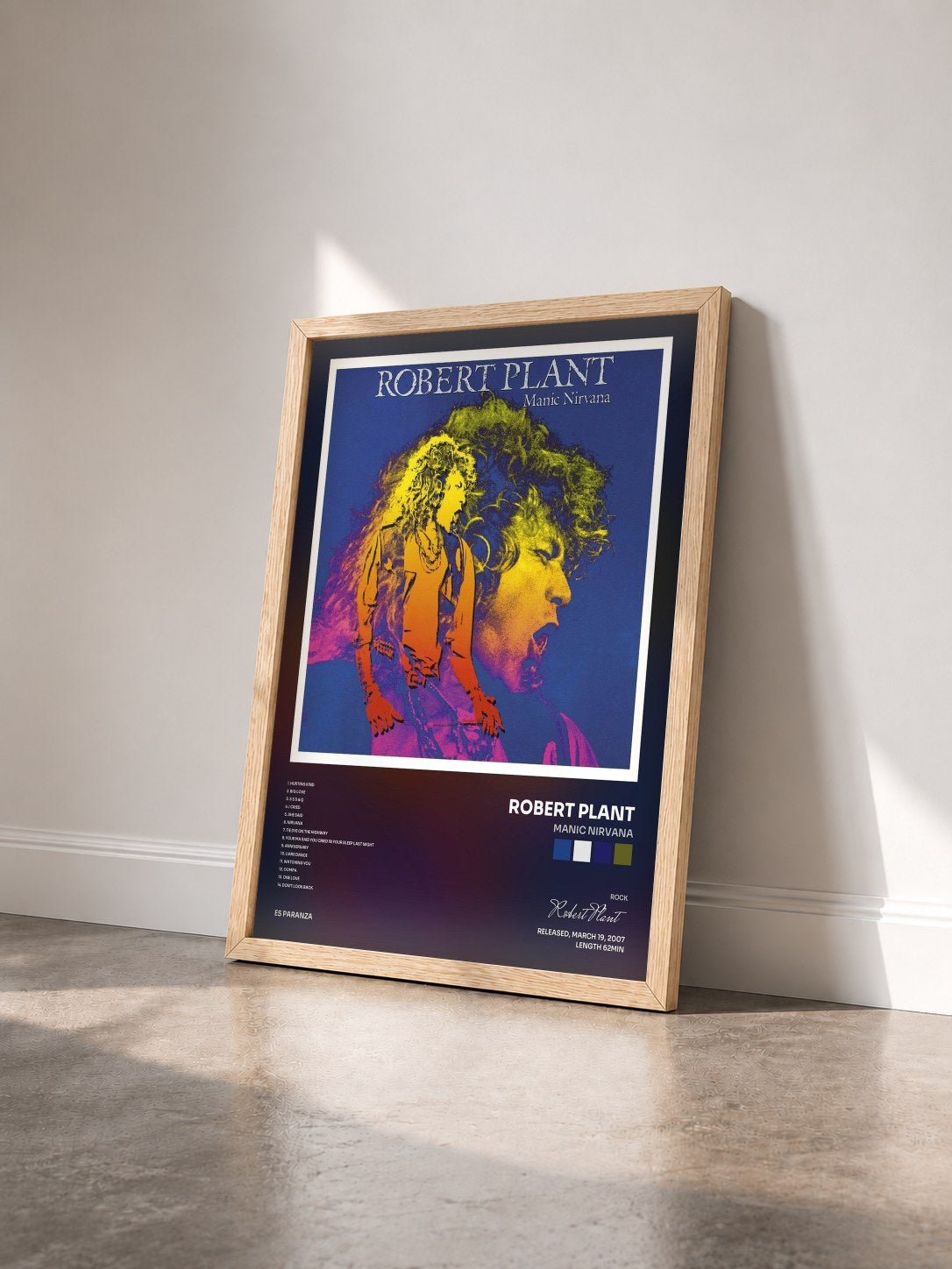 #bois Tableau de l'album Manic Nirvana de Robert Plant vu de trois quarts, cadre en bois brut