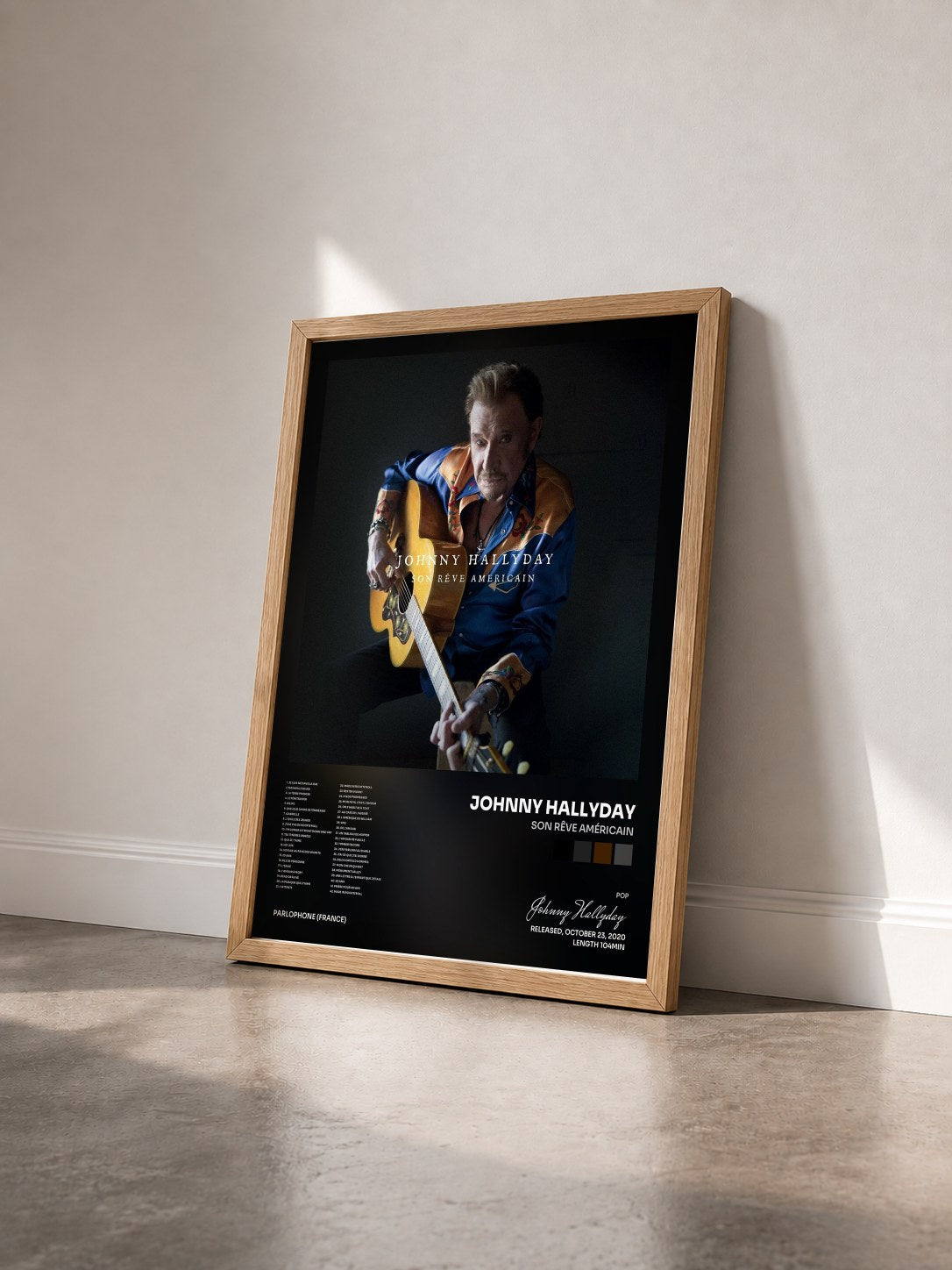 #bois Tableau de l'album Son rêve américain de Johnny Hallyday vu de trois quarts, cadre en bois brut
