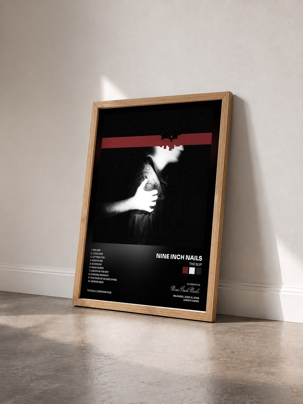 #bois Tableau de l'album The Slip de Nine Inch Nails vu de trois quarts, cadre en bois brut