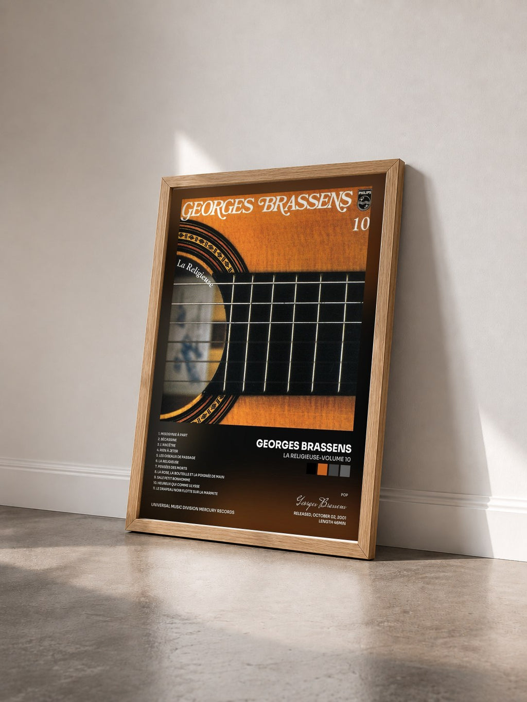 #bois Tableau de l'album La Religieuse-Volume 10 de Georges Brassens vu de trois quarts, cadre en bois brut