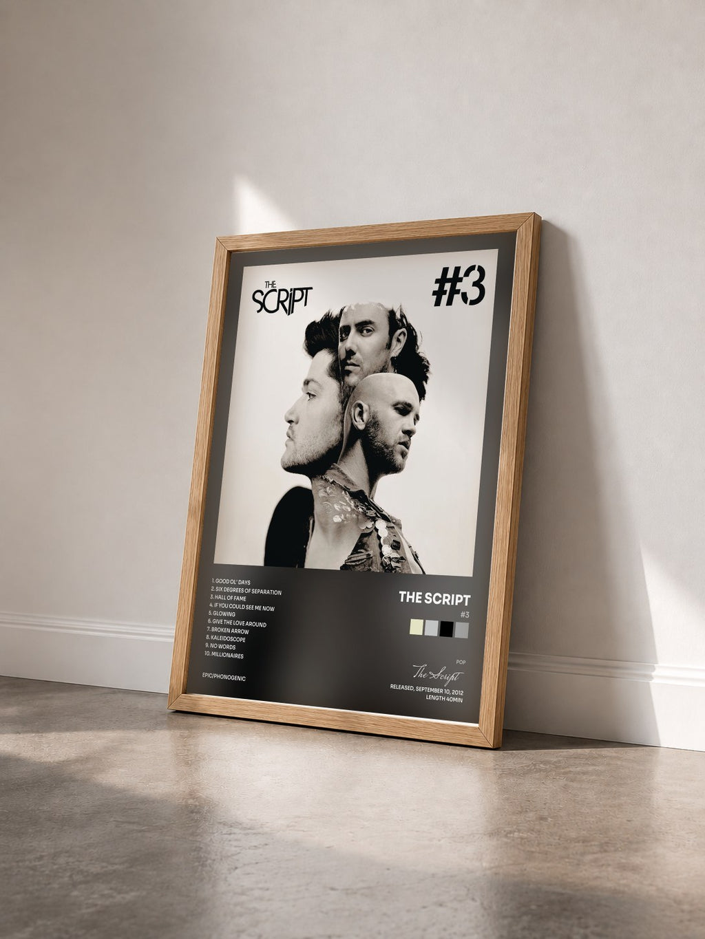 #bois Tableau de l'album #3 de The Script vu de trois quarts, cadre en bois brut