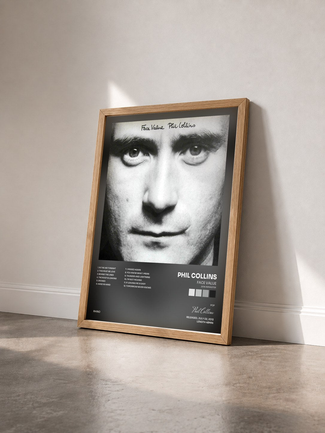 #bois Tableau de l'album Face Value (2016 Remaster) de Phil Collins vu de trois quarts, cadre en bois brut