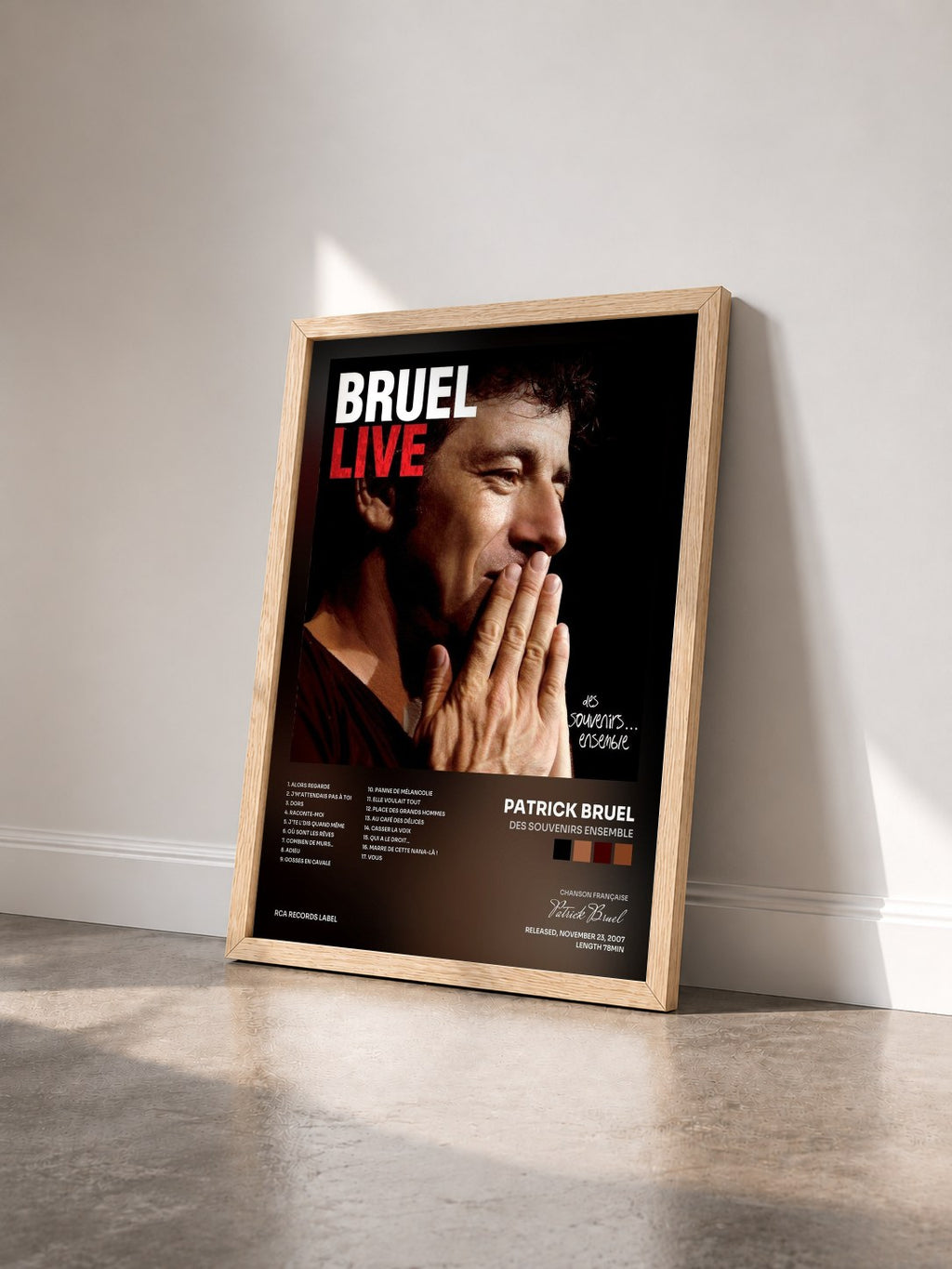 #bois Tableau de l'album Des souvenirs ensemble de Patrick Bruel vu de trois quarts, cadre en bois brut