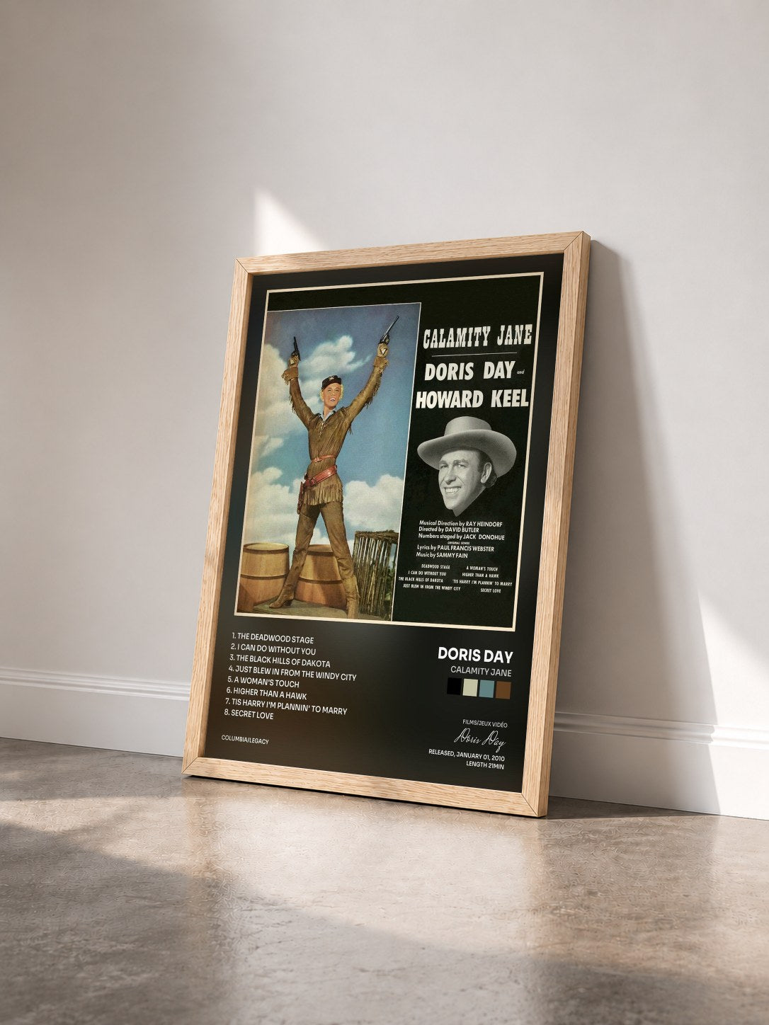 #bois Tableau de l'album Calamity Jane de Doris Day vu de trois quarts, cadre en bois brut