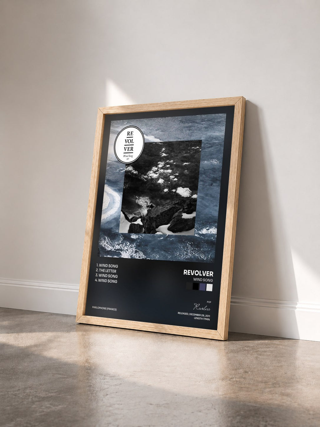 #bois Tableau de l'album Wind Song de Revolver vu de trois quarts, cadre en bois brut