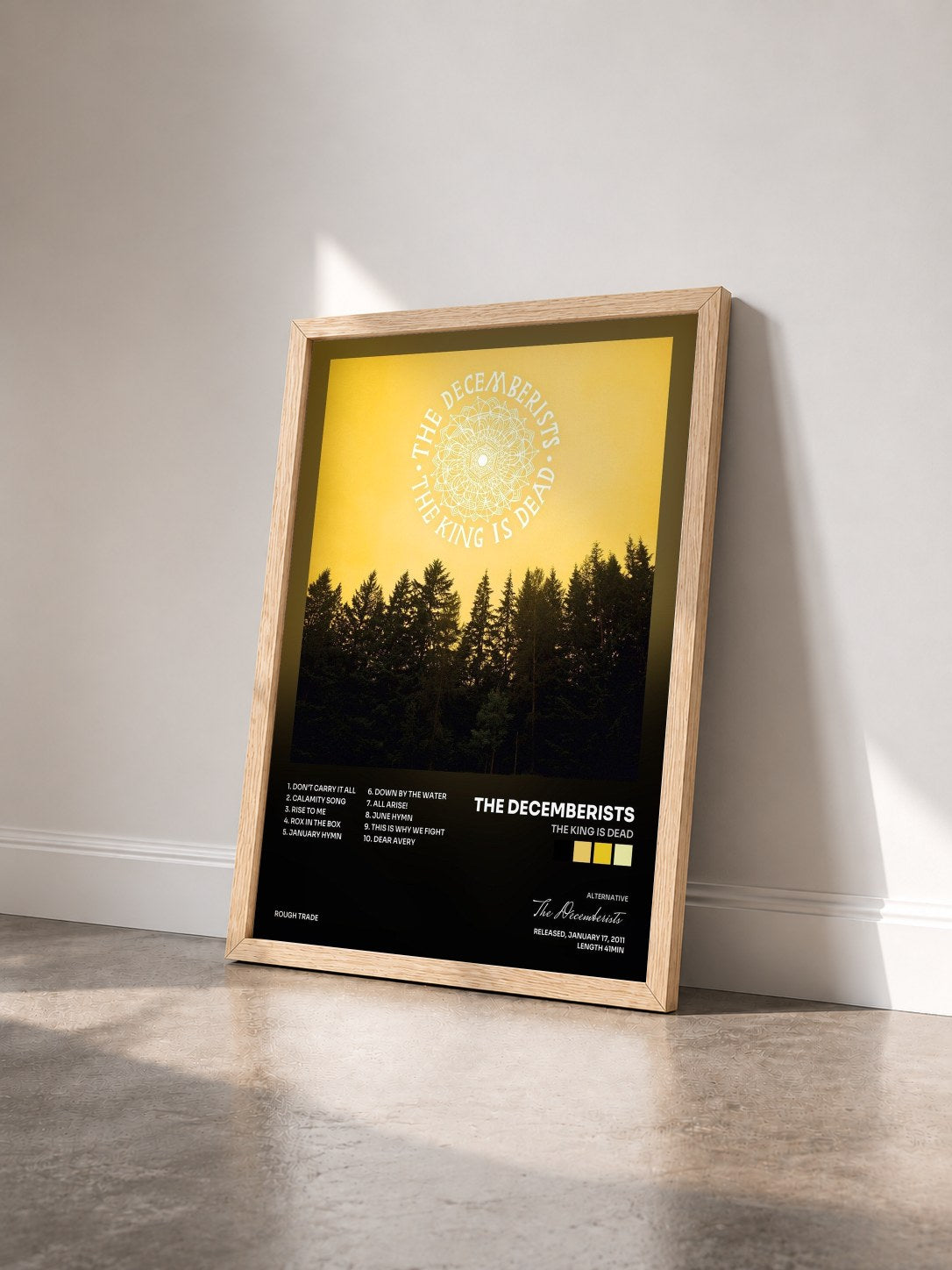 #bois Tableau de l'album The King Is Dead de The Decemberists vu de trois quarts, cadre en bois brut