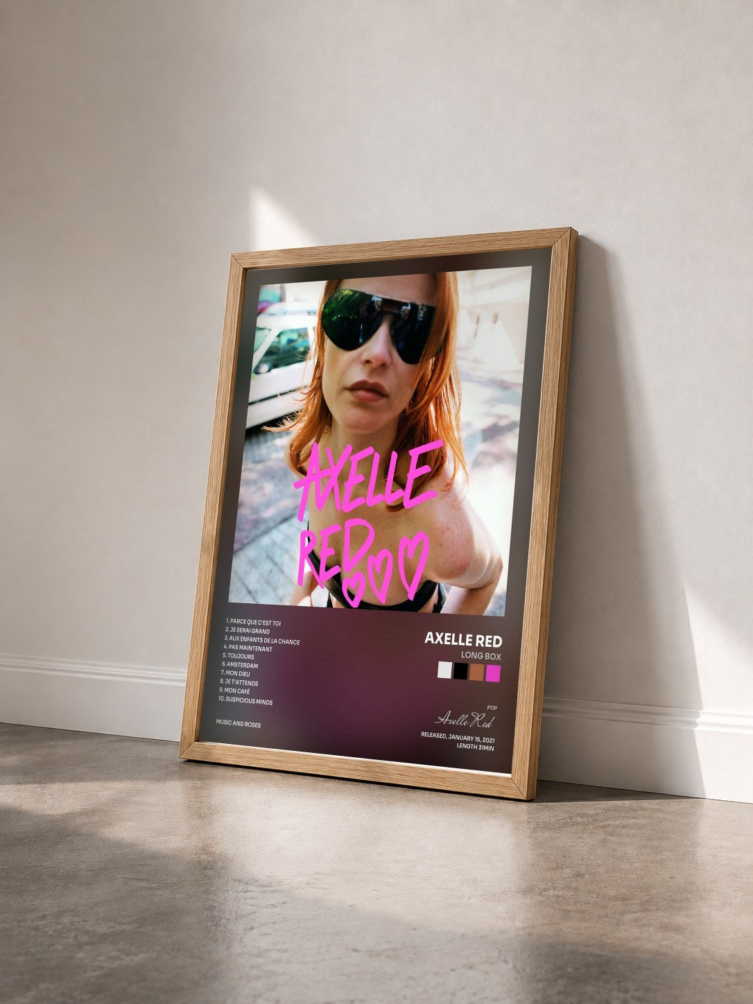 #bois Tableau de l'album Long box de Axelle Red vu de trois quarts, cadre en bois brut